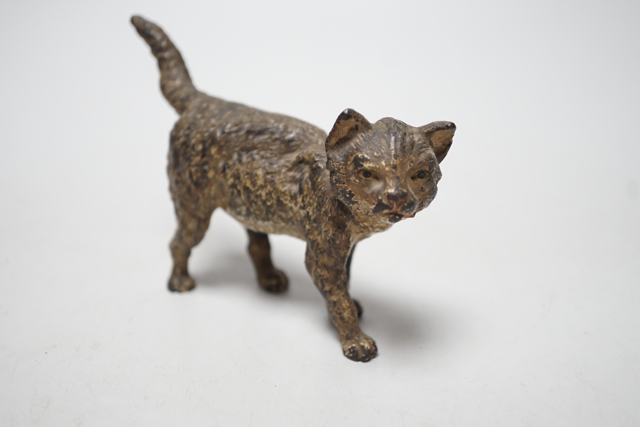 A cold painted bronze figure of standing cat, early 20th century, 13cm long